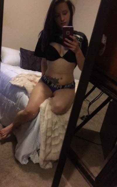 Nice Girl In Front Of Her Mirror