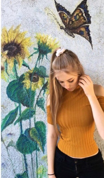 Curvy Blonde Teasing The Camera