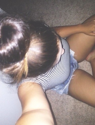 Curvy Brunette Teasing The Camera