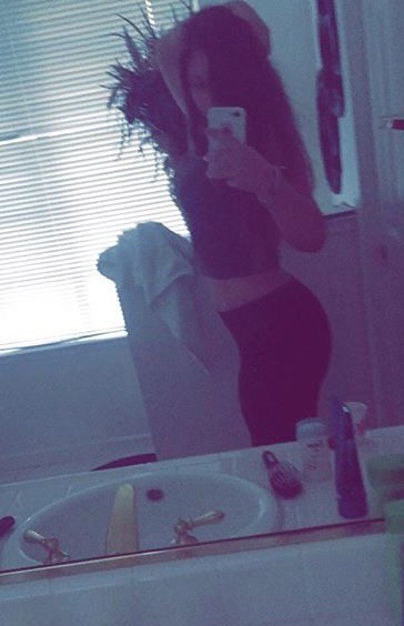 Curvy Brunette Teasing The Camera