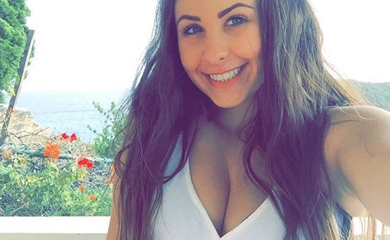 Curvy Brunette Teasing The Camera