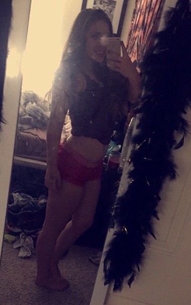 Curvy Brunette Teasing The Camera