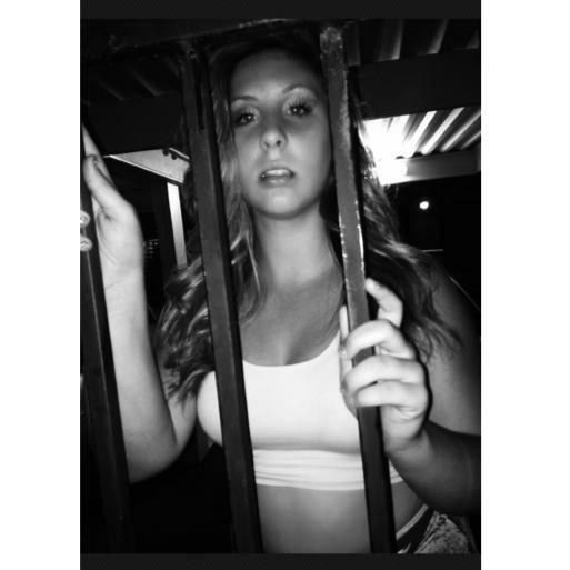 Curvy Brunette Teasing The Camera