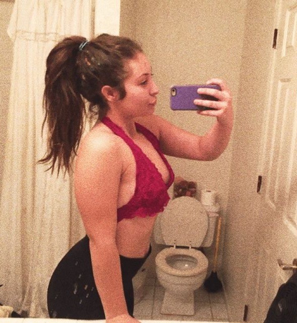 Curvy Brunette Teasing The Camera