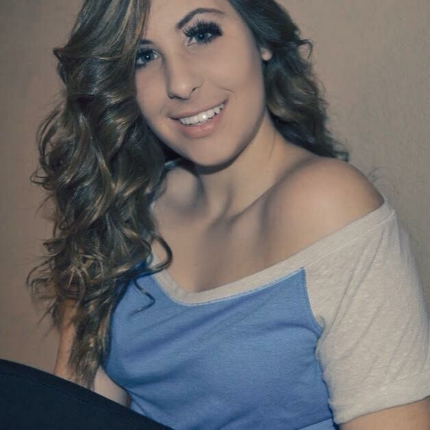 Curvy Brunette Teasing The Camera