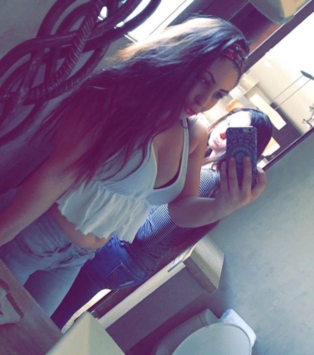 Curvy Brunette Teasing The Camera