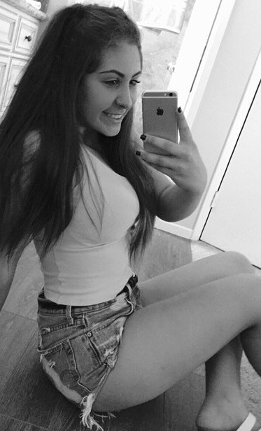 Curvy Brunette Teasing The Camera