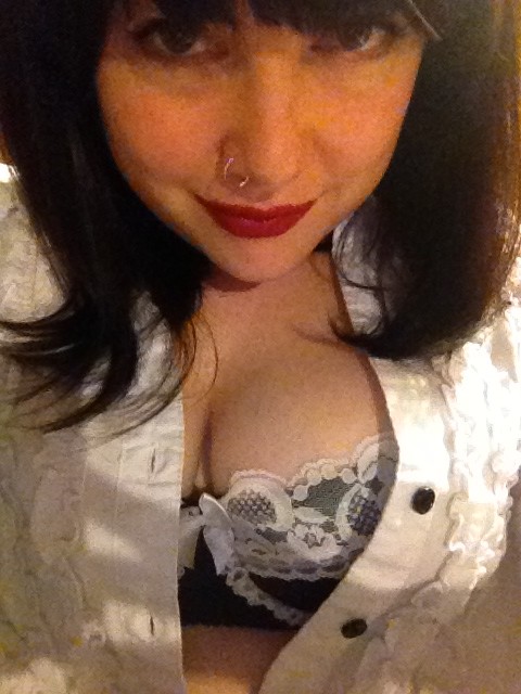 Curvy Brunette In Red Llipstick And Stockings