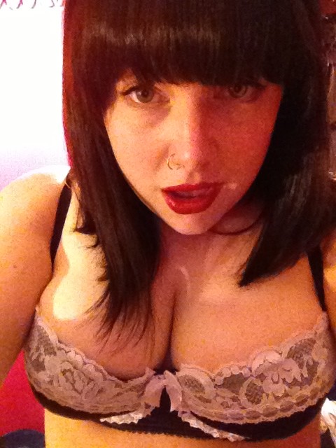 Curvy Brunette In Red Llipstick And Stockings