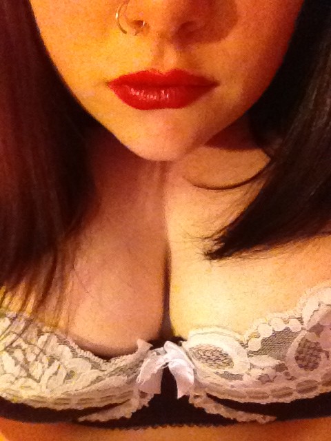 Curvy Brunette In Red Llipstick And Stockings