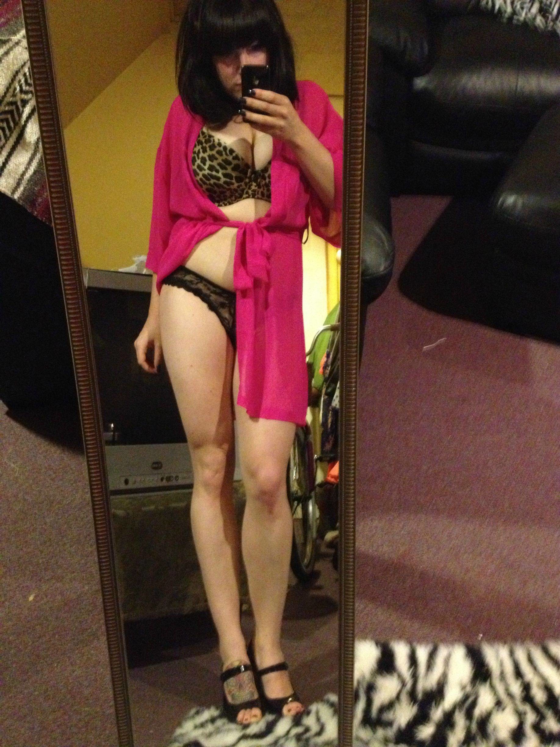 Curvy Brunette In Red Llipstick And Stockings