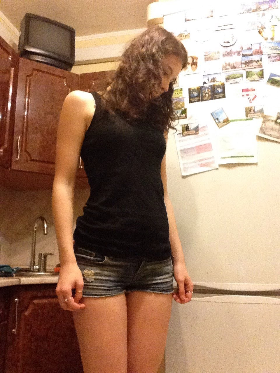 A Simple Brunette Strip Tease at Home