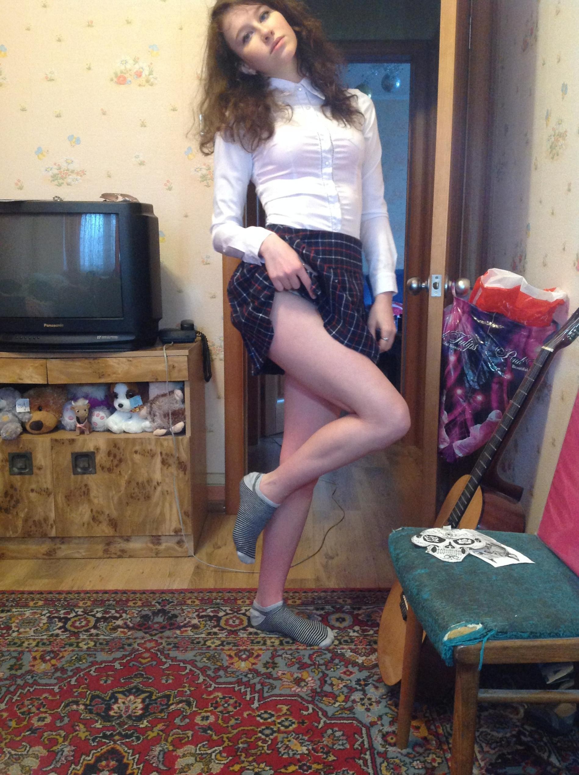 A Simple Brunette Strip Tease at Home