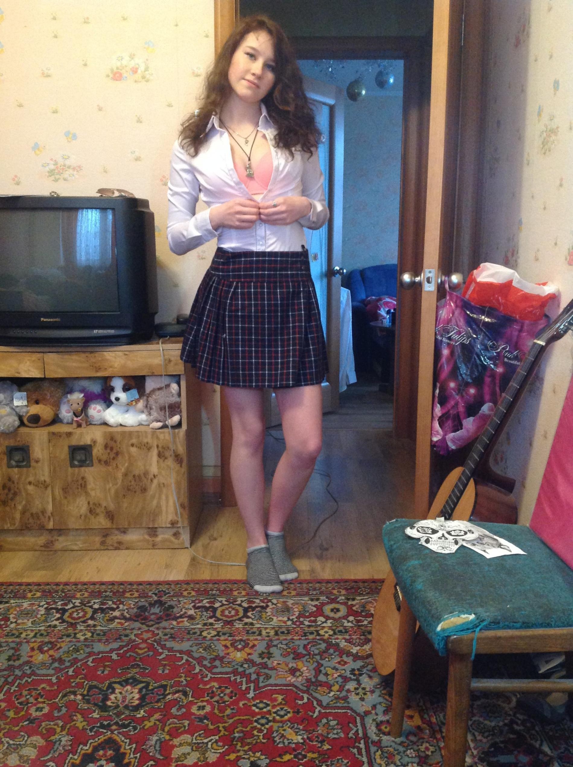 A Simple Brunette Strip Tease at Home