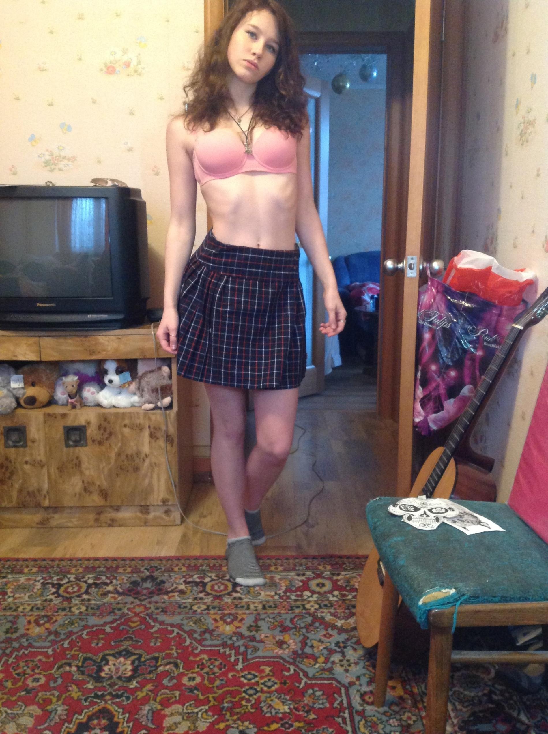 A Simple Brunette Strip Tease at Home