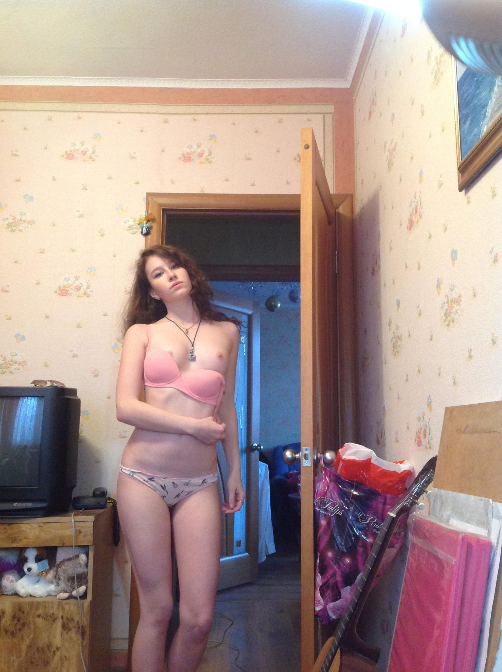 A Simple Brunette Strip Tease at Home