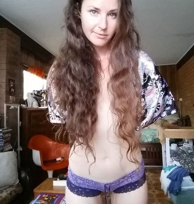 Pale Brunette Seductive Posing