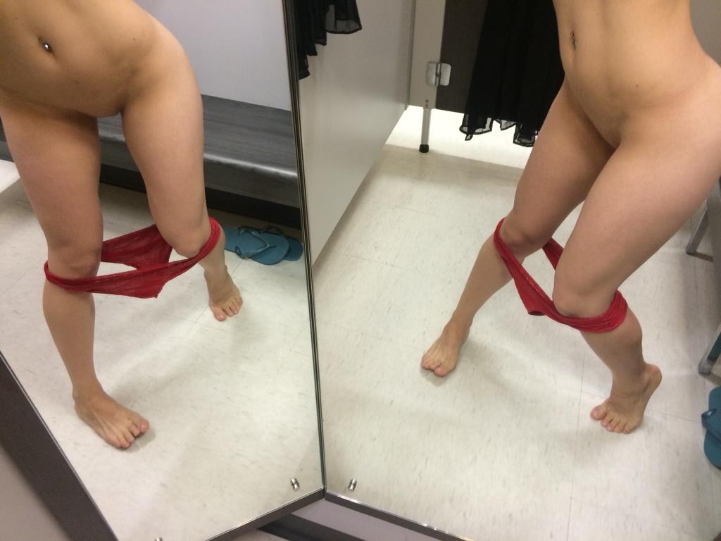 Girl in changing room nude and in tiny panty thong