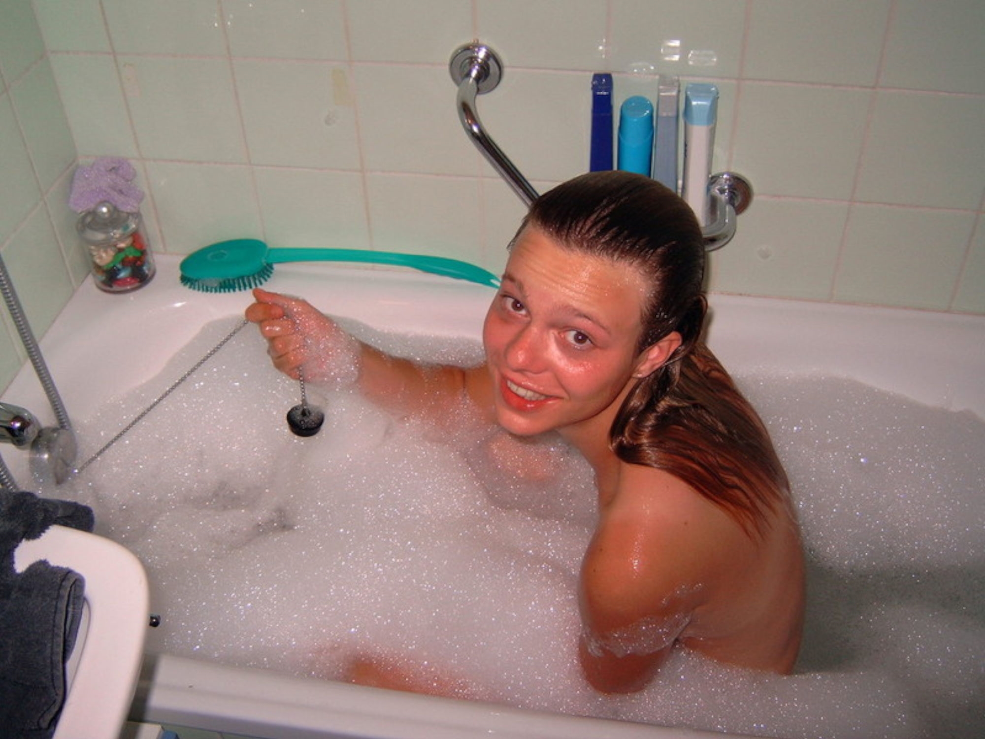 Jenny posing around naked