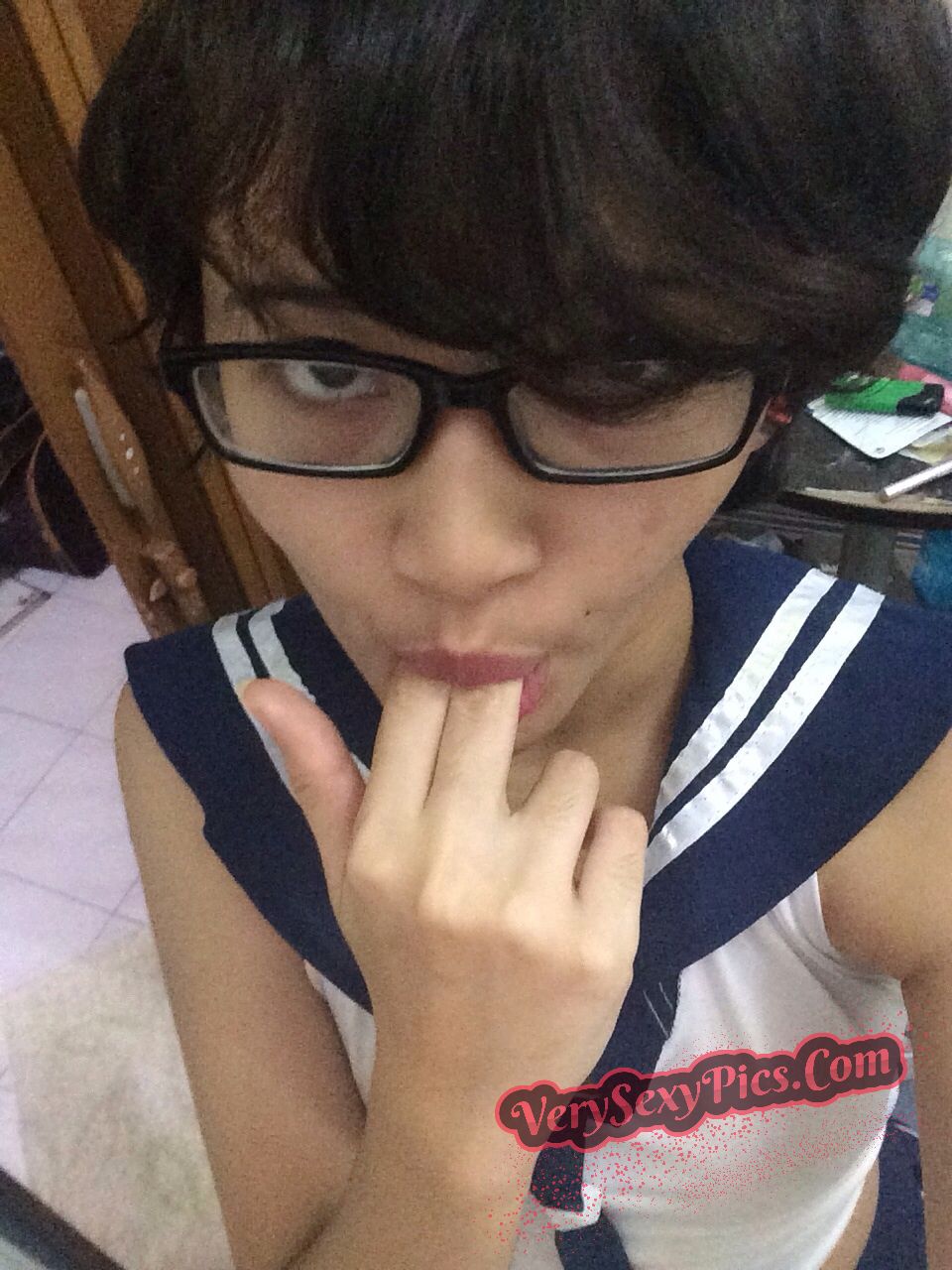 Nerdy Asian Babe Stripping Naked