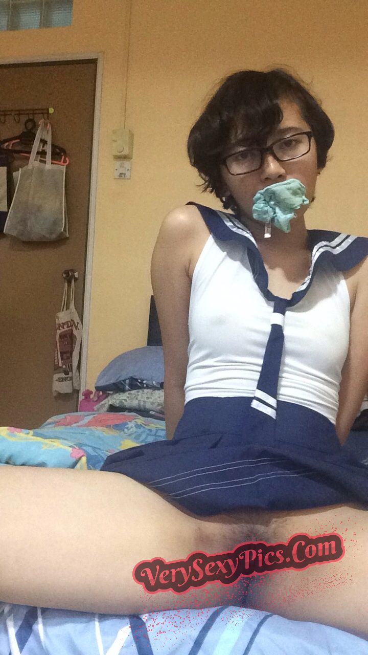 Nerdy Asian Babe Stripping Naked