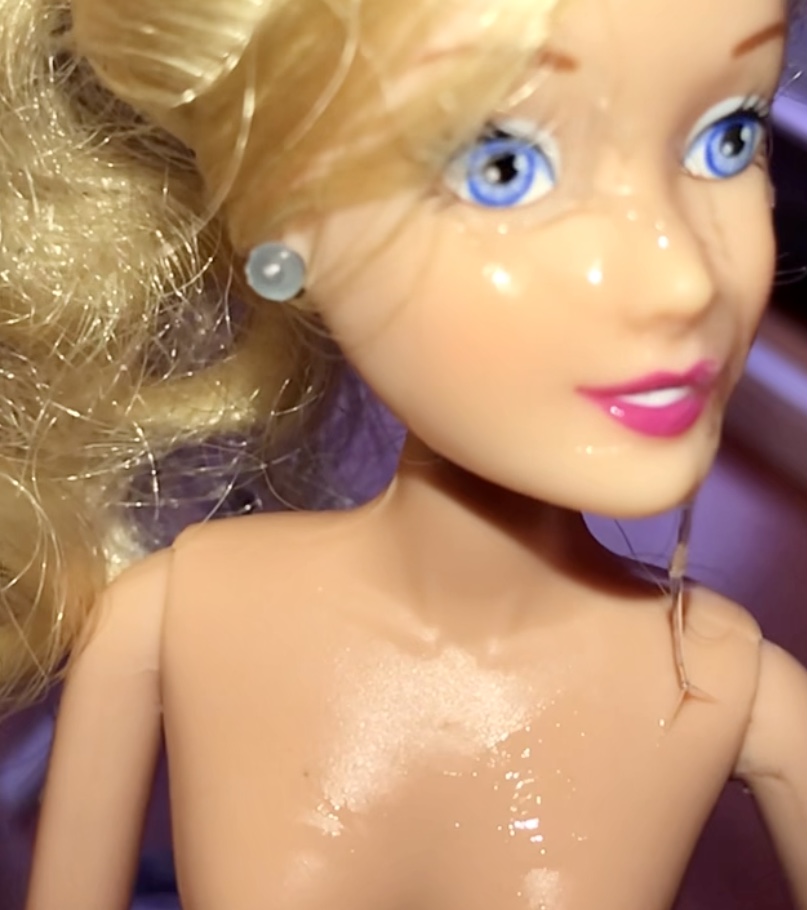 Rubbing precum on Barbie and facial