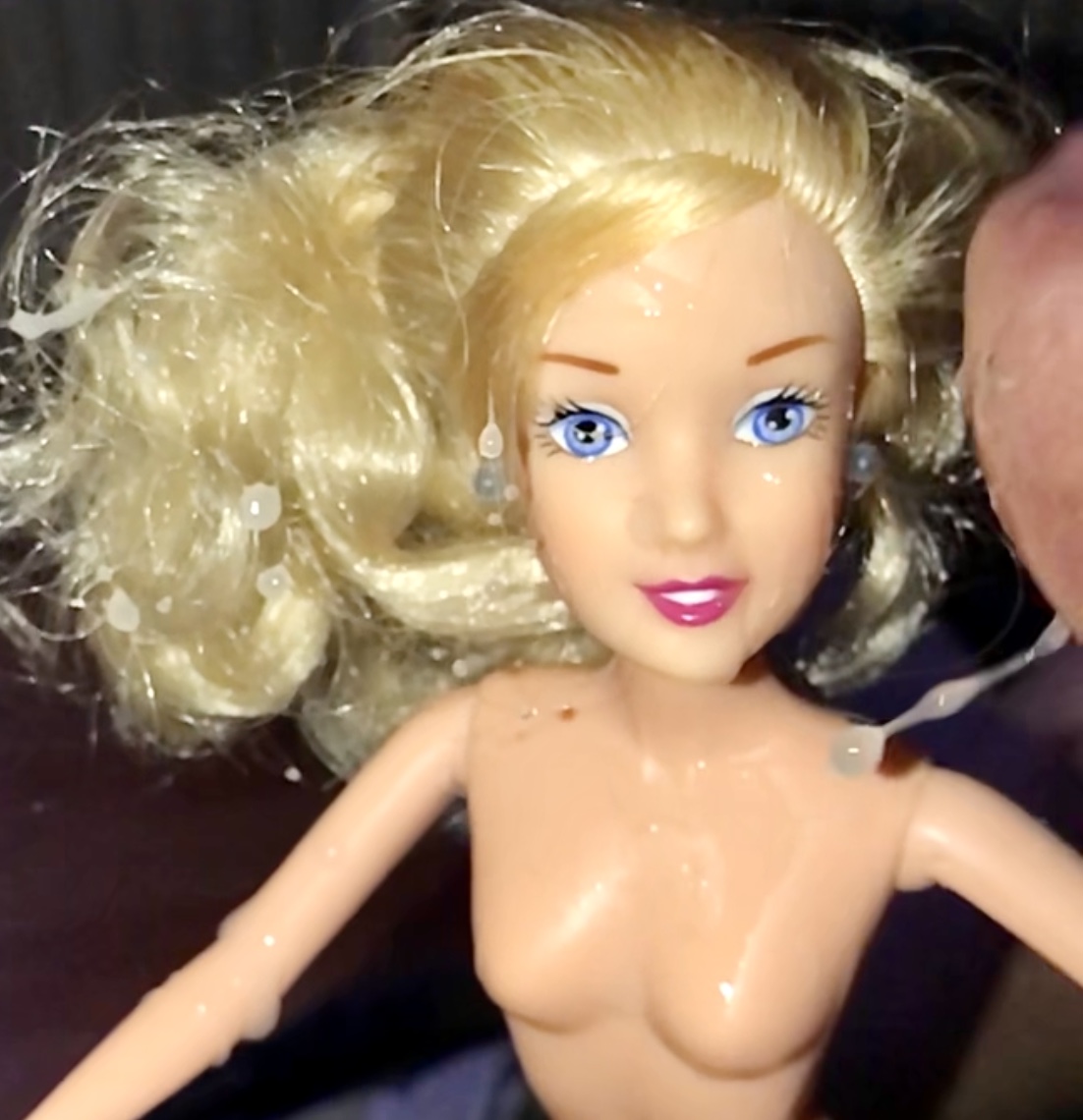 Rubbing precum on Barbie and facial