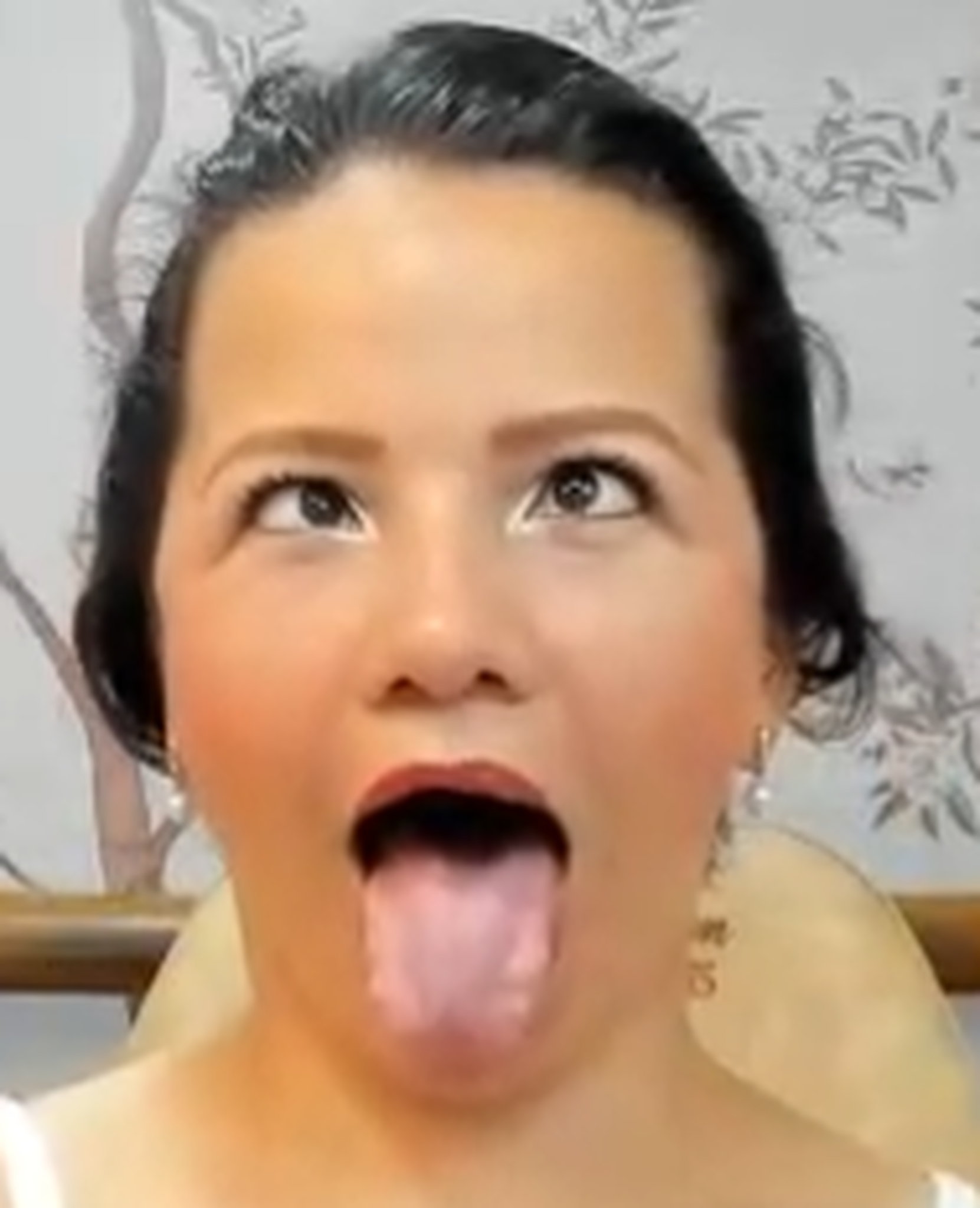 Turning the girl into their eyes and sticking out their tong