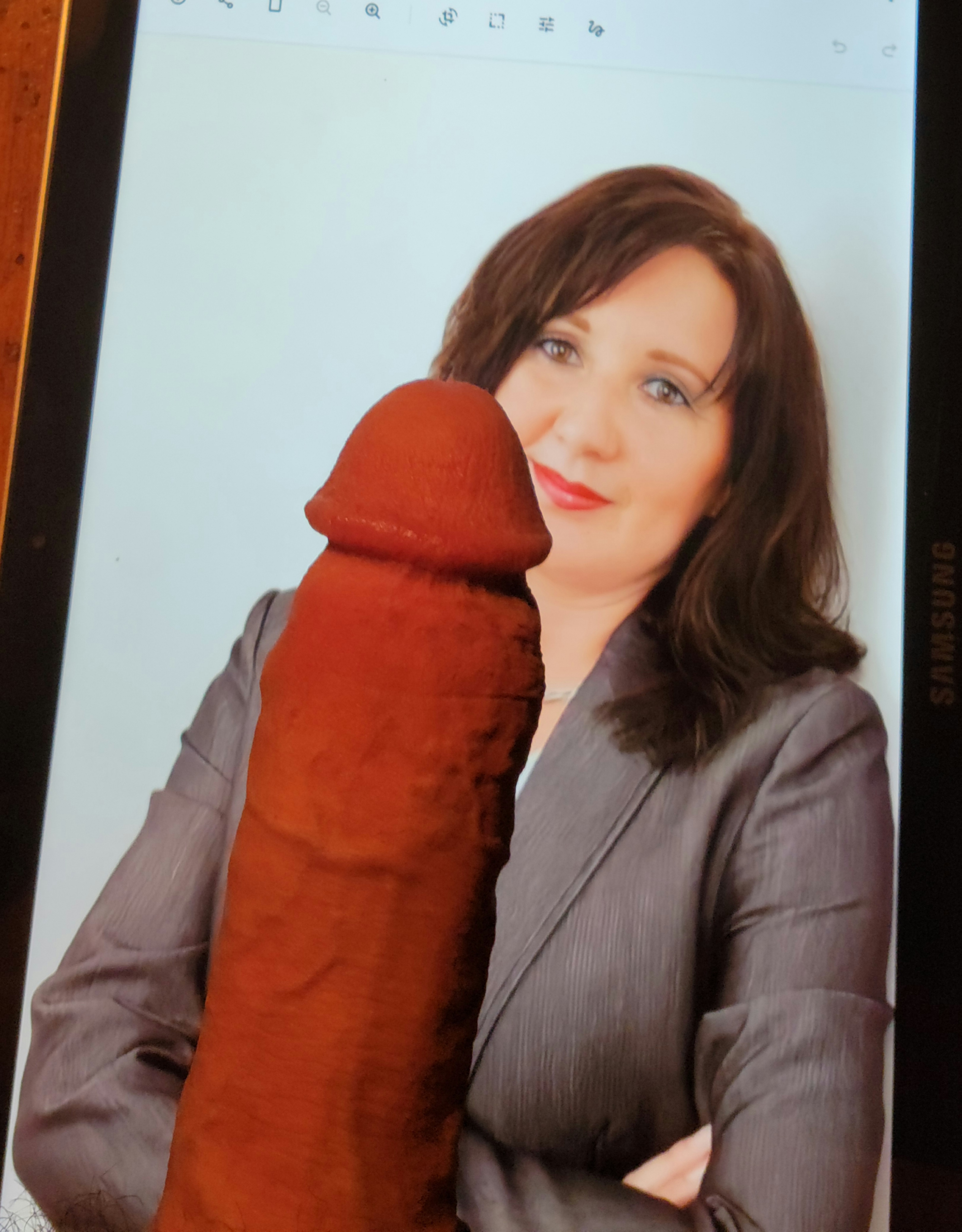 Secretary Michaela makes some cocks hard and cum