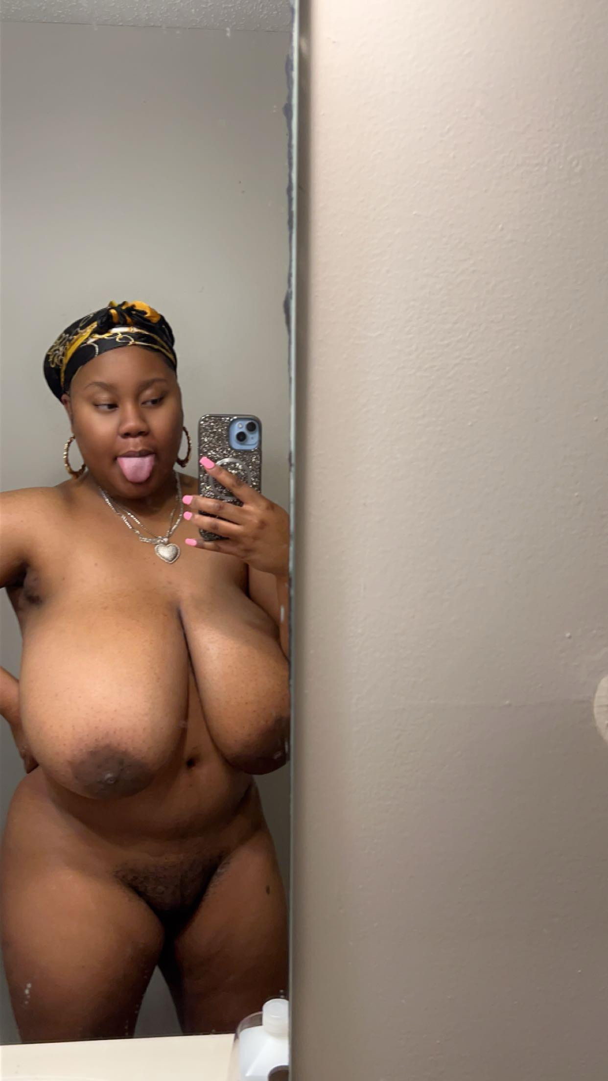 Thick ebony cow with massive udders