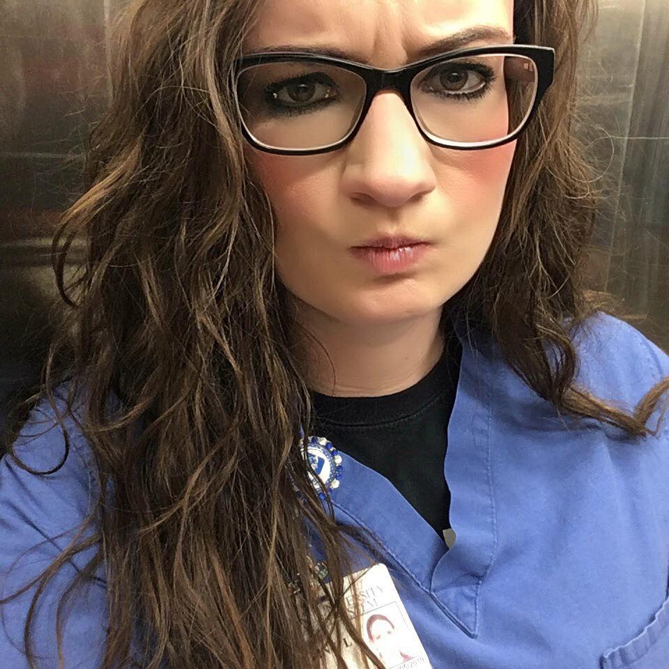 Sexy slut nurse Jackie loves showing off tits, ass, and puss