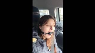 Elf wears ball gag in public