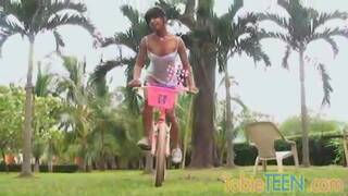 Petite teen strips off and plays with her pussy