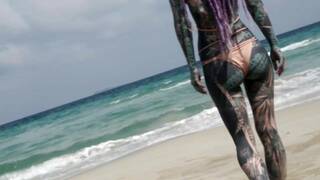 Heavily tattooed dreadlocks Anuskatzz holiday ocean tease with Lily Lu