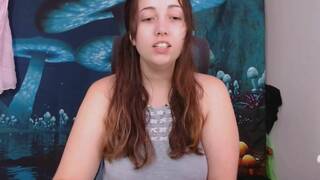 Curvy girl spreads her legs and masturbates her hairy slit