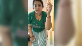 Cute mature showing huge boobs and pussy