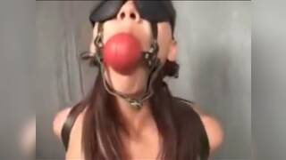 Taming Asian slut with gag, chain and cock