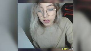Petite Blonde with Glasses fingering her pussy