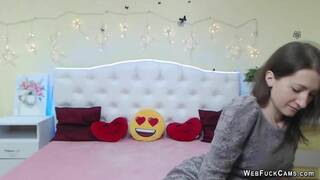 Brunette amateur flashes tits in bra on solo webcam show