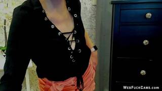 Clothed busty German MILF on webcam posing