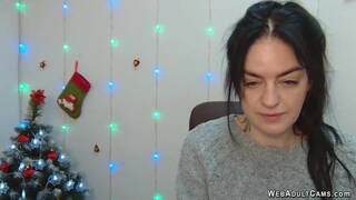 Brunette babe LeksyPapii in grey sweater posing in front of webcam