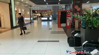 Big-tit milf publicly masturbates in a changing room