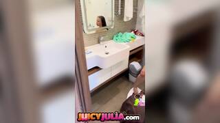 Juicy Julia  peeing in bathroom and showing her big tits