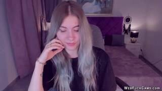 Blonde teen SimaDark smoking vape and stripping off on solo webcam show