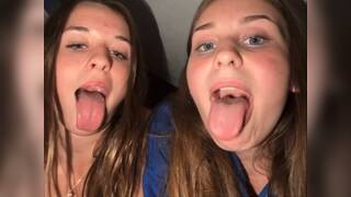 2 women open mouths for cum