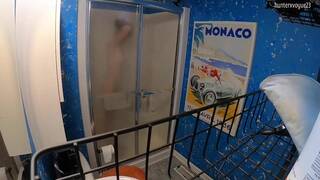hidden cam of a young girl taking a shower