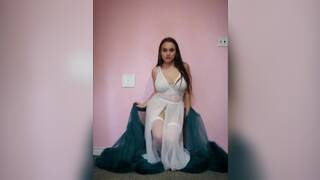 Busty Brunette's Sensual Striptease in BDSM-themed Lingerie