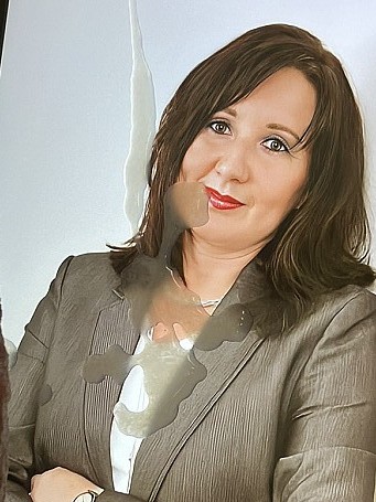 Secretary Michaela is a sexy cum target