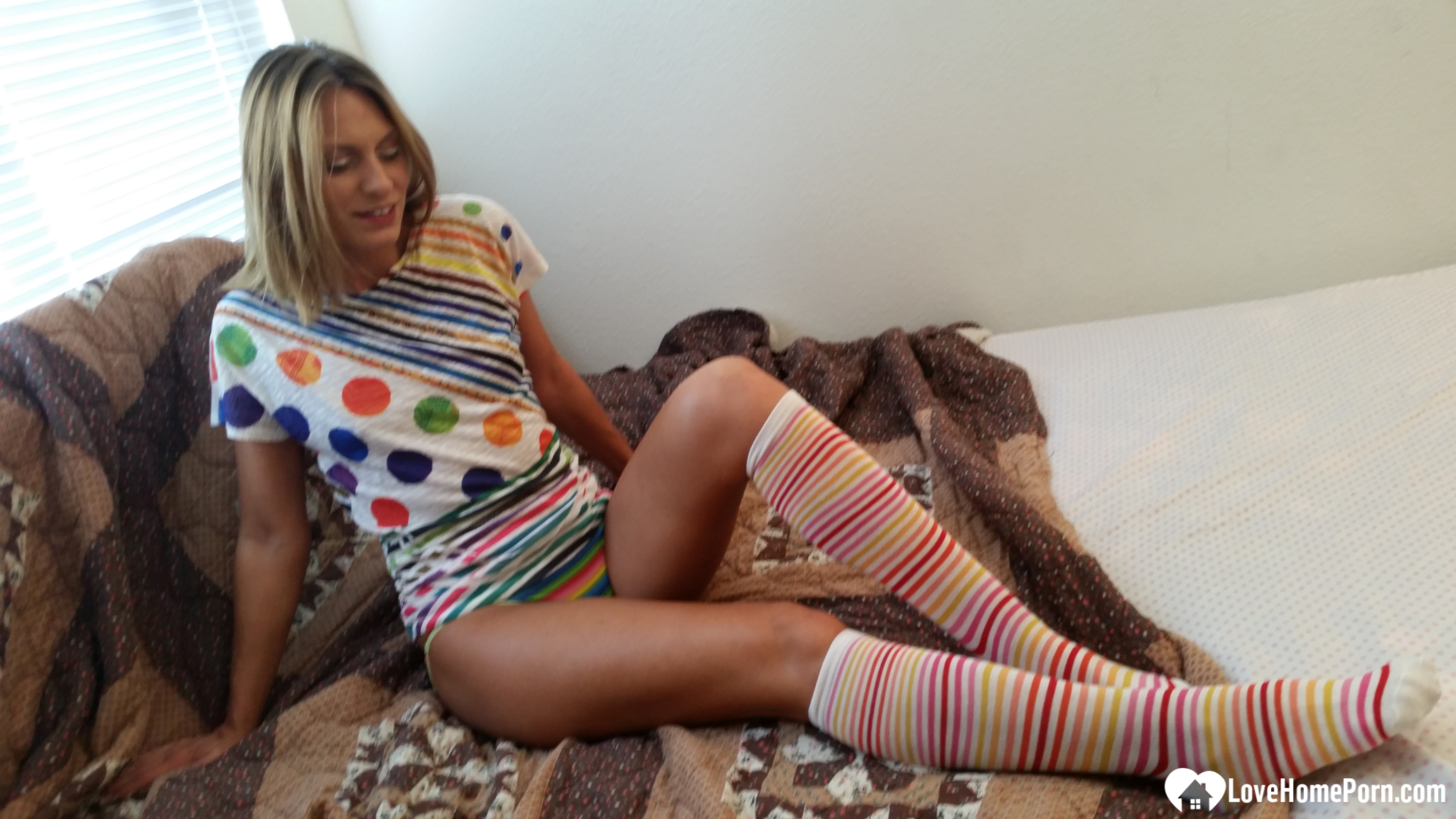 Babe with cute socks shows her dildo skills