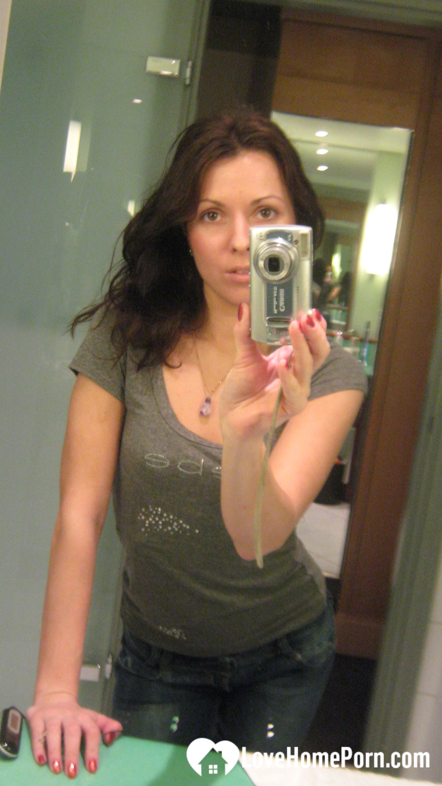 Innocent brunette teasing in her own bathroom